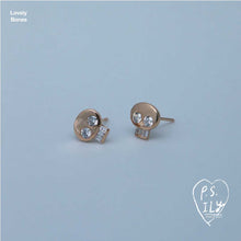 Load image into Gallery viewer, PS ILY Skull earrings in rose gold and diamonds