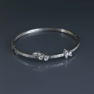 Channel Set Baguette Diamond Bangle with Offset Fancy Shaped Diamonds