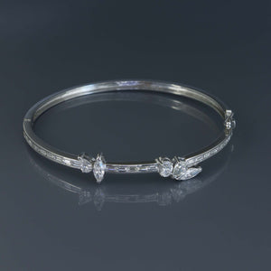 Channel Set Baguette Diamond Bangle with Offset Fancy Shaped Diamonds