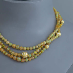 Ethiopian Opal Torsade with Diamond Star Set Gold Spheres