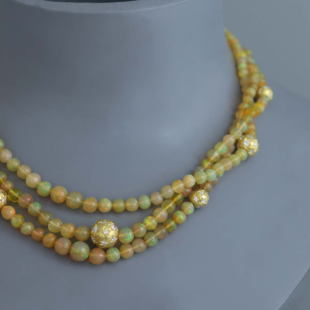 Ethiopian Opal Torsade with Diamond Star Set Gold Spheres