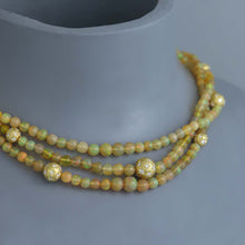Load image into Gallery viewer, Ethiopian Opal Torsade with Diamond Star Set Gold Spheres

