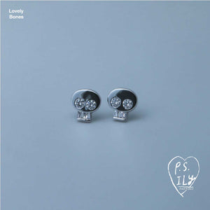 PS ILY Skull earrings in white gold and diamonds