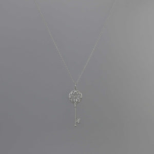 Key Pendant with Pave Scallop Detail in White Gold