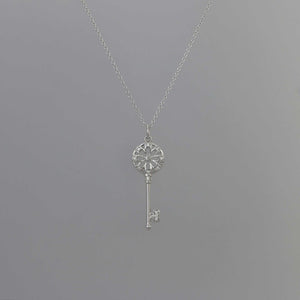 Key Pendant with Pave Scallop Detail in White Gold